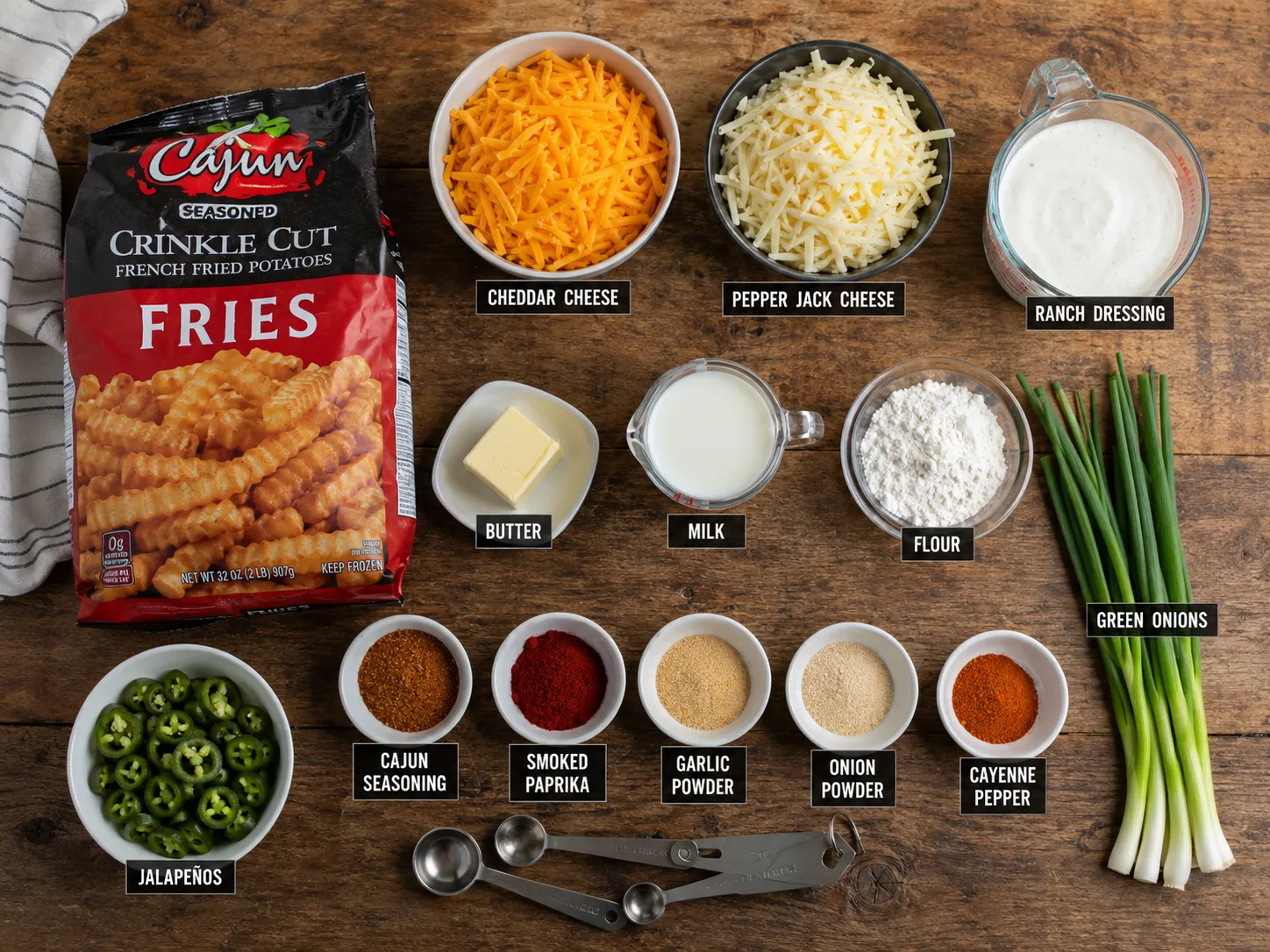 Ingredients for homemade Louisiana Voodoo Fries on a kitchen counter